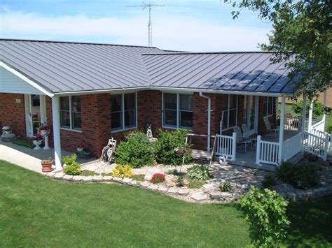 grey metal roof on red brick house|metal roofs on brick houses.